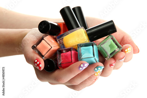 Photo: woman hands with nail polishes isolated on white woman hands with nail polishes isolated on white