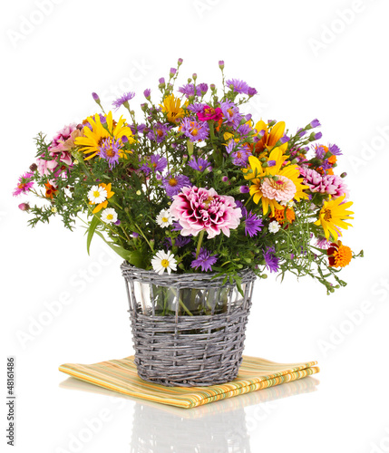 Photo: beautiful bouquet of bright flowers in basket isolated on white beautiful bouquet of bright flowers in basket isolated on white