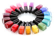 Group of bright nail polishes isolated on white