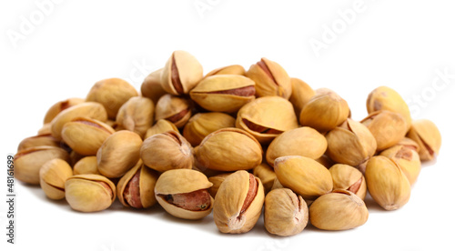 Photo: tasty pistachio nuts, isolated on white tasty pistachio nuts, isolated on white