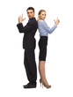 man and woman making a gun gesture