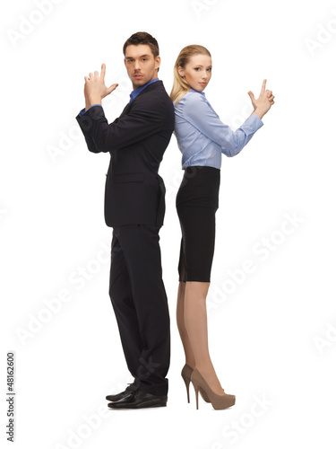 Photo: man and woman making a gun gesture man and woman making a gun gesture