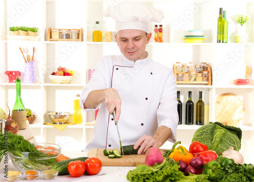 Photo: Chef cooking in kitchen Chef cooking in kitchen