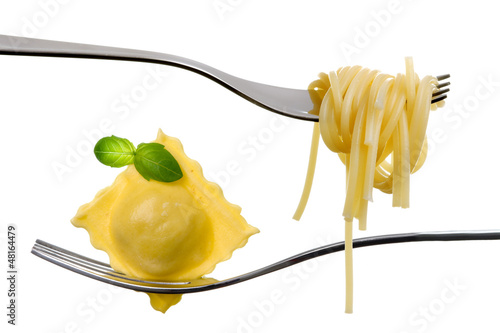 Photo: ravioli pasta parcel and spaghetti on fork white background ravioli pasta parcel and spaghetti on fork white background