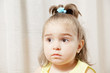 Little girl looking sideways