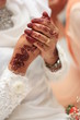 Bride reciting prayer.
