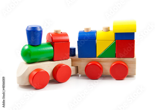 Photo: Colorful wooden toy train isolated on white background Colorful wooden toy train isolated on white background