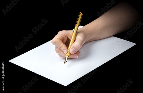 Photo: hand and pen hand and pen