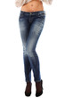 Closeup of beautiful legs in jeans