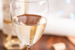 glass and bottle white wine on blink light
