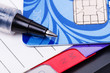 Photo: Credit card, diary and pen Credit card, diary and pen