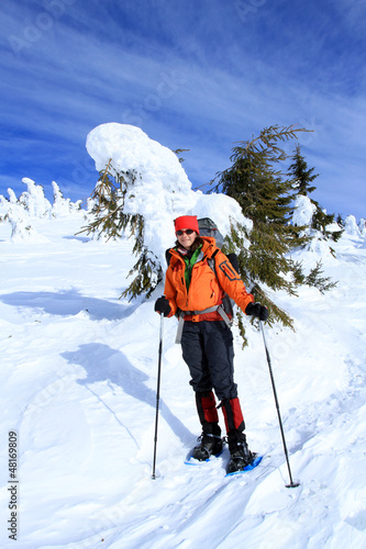 Photo: Winter hiking in snowshoes. Winter hiking in snowshoes.