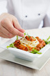 Photo: Male chef in restaurant Male chef in restaurant