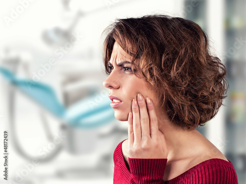 Photo: Girl with a painful tooth Girl with a painful tooth