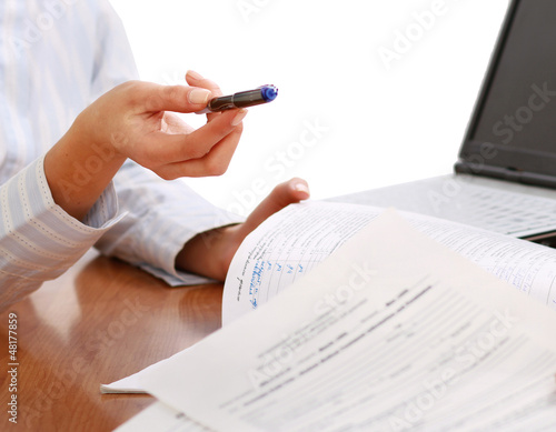 Photo: businesswoman giving you the pen businesswoman giving you the pen