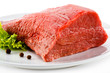 Photo: Raw beef and vegetables on white background Raw beef and vegetables on white background