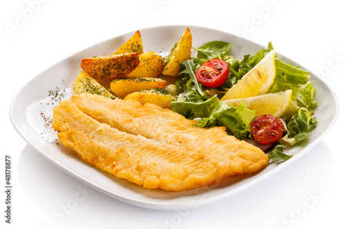 Photo: Fish dish - fried fish fillet and vegetables Fish dish - fried fish fillet and vegetables