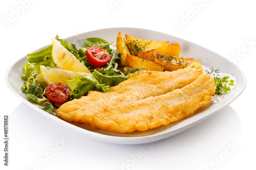 Photo: Fish dish - fried fish fillet and vegetables Fish dish - fried fish fillet and vegetables