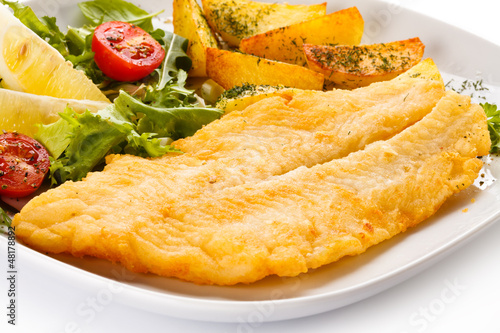 Photo: Fish dish - fried fish fillet and vegetables Fish dish - fried fish fillet and vegetables