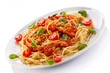 Pasta with meat, tomato sauce, parmesan and vegetables