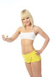 Attractive athletic girl drinks milk