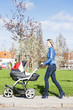 woman with a pram on spring walk