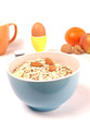 Muesli with an egg and fresh fruits