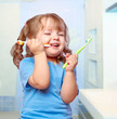 Photo: girl brushing her teeth girl brushing her teeth
