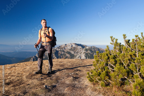 Photo: Adult hiker at Ornak Peak, Tatra Mountains, Poland Adult hiker at Ornak Peak, Tatra Mountains, Poland