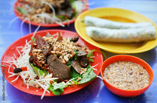 Photo: Duck meat on shredded daikon, peanuts and spring rolls Duck meat on shredded daikon, peanuts and spring rolls