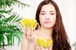 Photo: Woman holding two bowl full of fruit Woman holding two bowl full of fruit
