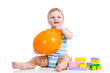 kid playing with building blocks toy