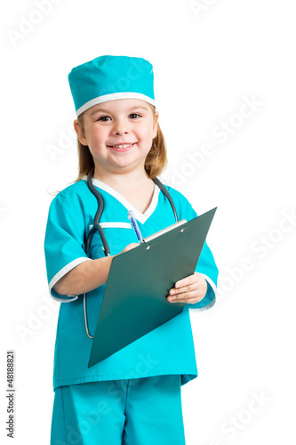 Photo: Cute kid girl uniformed as doctor over white background Cute kid girl uniformed as doctor over white background