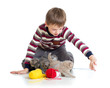 child boy playing with kittens isolated on white background