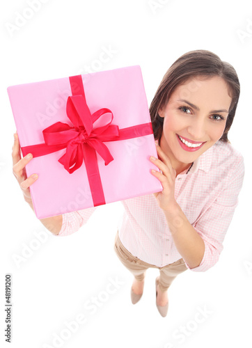 Photo: Attractive woman holding gift Attractive woman holding gift