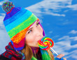 Woman with lollipop outdoors