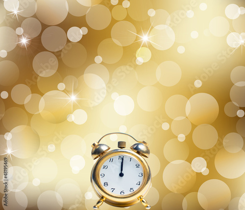 Illustration: A Happy New Year Clock Striking Midnight abstract Lights A Happy New Year Clock Striking Midnight abstract Lights