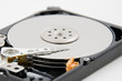 close up of hard disk plate and reader head