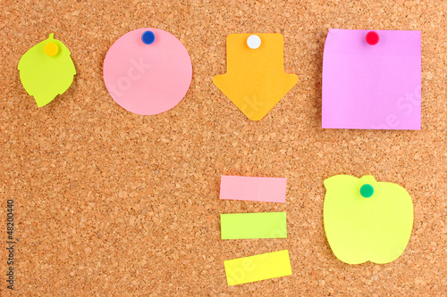 Photo: Colorful sticky notes on board Colorful sticky notes on board