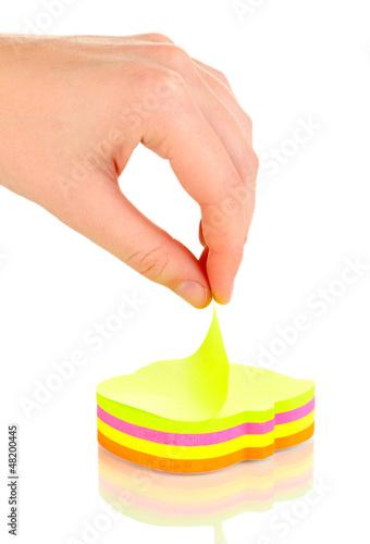 Photo: human hand holding sticker isolated on white human hand holding sticker isolated on white
