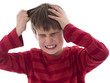 Photo: frustrated boy pulling out hair frustrated boy pulling out hair