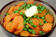 Fresh cooked peas and carrots