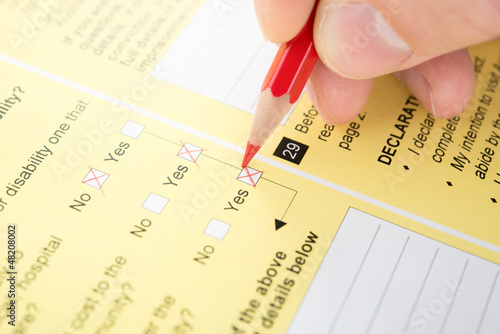 Photo: Filling Yes in checkbox of questionnaire Filling Yes in checkbox of questionnaire