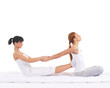 A young redhead woman on a Thai massage procedure