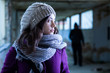 Photo: Worried Woman Stalked by a Man Worried Woman Stalked by a Man