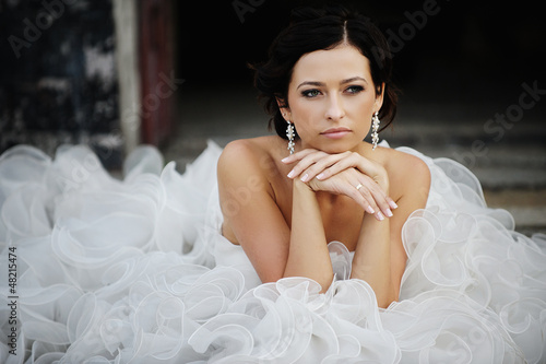 Photo: Happy bride in surrounding the nature Happy bride in surrounding the nature