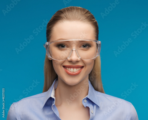 Photo: businesswoman in protective glasses businesswoman in protective glasses