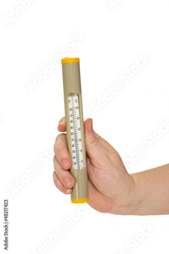 Photo: Thermometer to measure the temperature in a female hand isolated Thermometer to measure the temperature in a female hand isolated