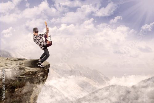 Photo: Guitarist play outdoor Guitarist play outdoor