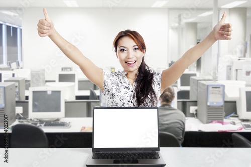 Photo: Successful businesswoman and blank monitor Successful businesswoman and blank monitor